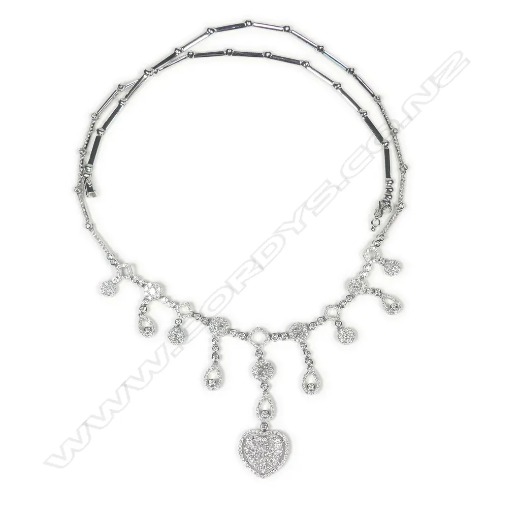 An 18ct white gold and multi-diamond set pendant necklace, Image 1++