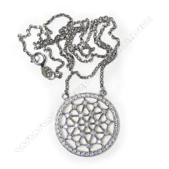 An 18ct white gold diamond pendant on chain,