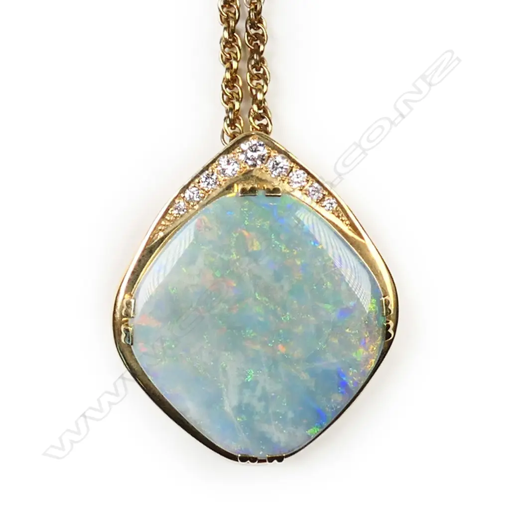 An 18ct gold, diamond and opal pendant, Image 1++