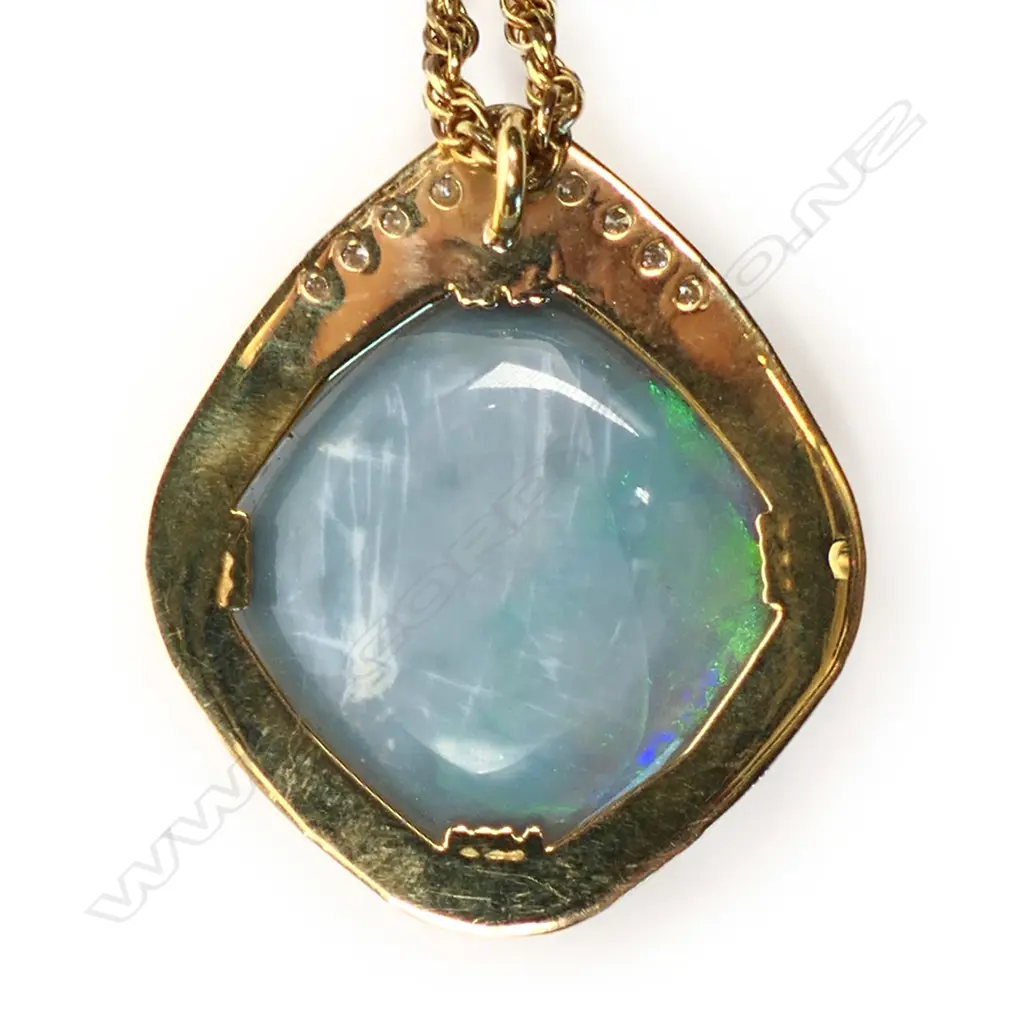 An 18ct gold, diamond and opal pendant, Image 1++