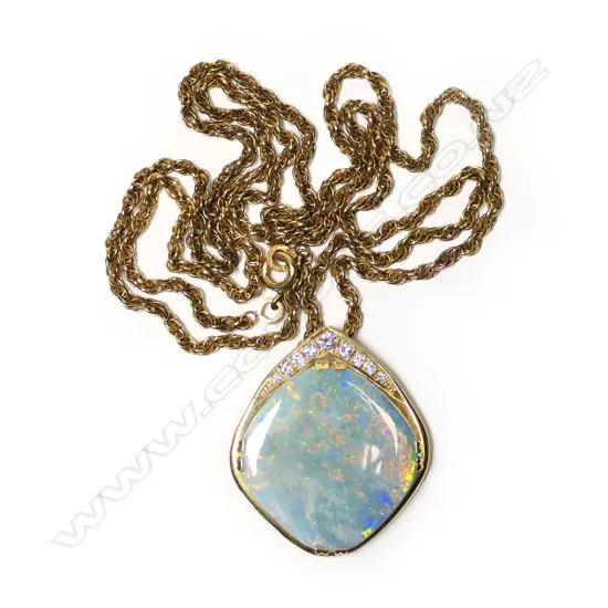An 18ct gold, diamond and opal pendant,