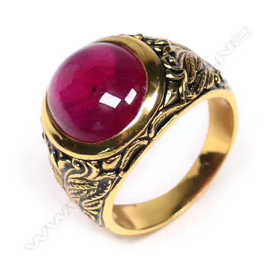 A large cabochon ruby and silver gilt ring