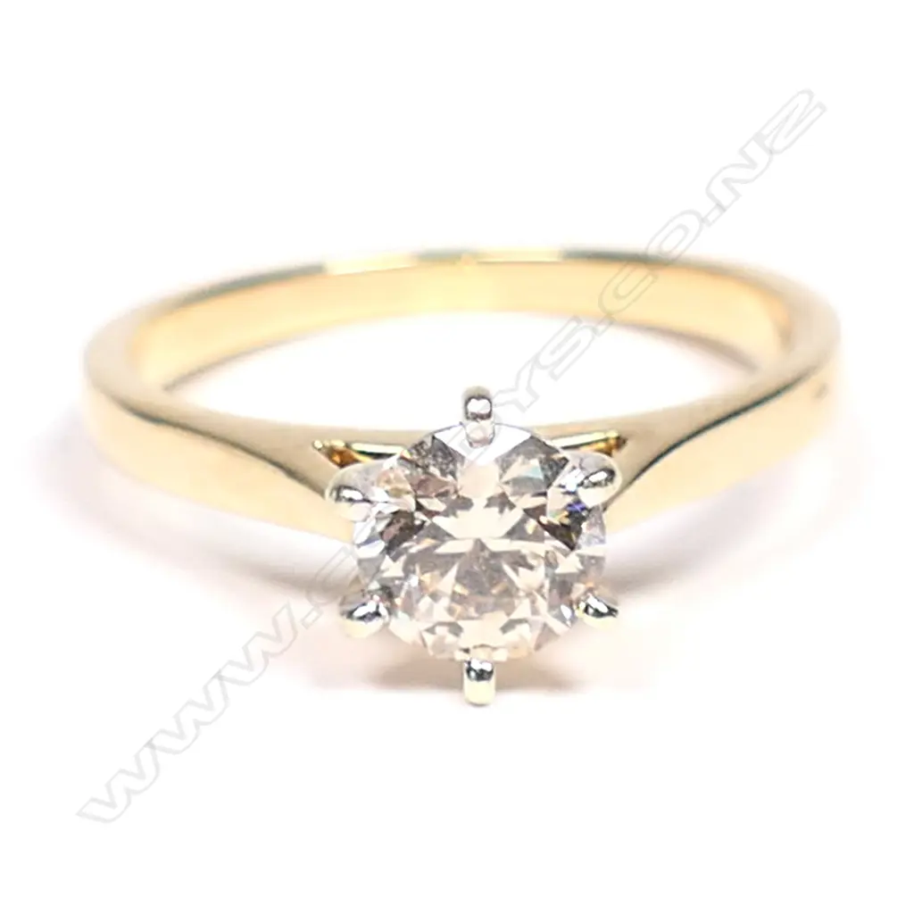 An 18ct gold and 1ct. diamond solitaire ring, Image 1++
