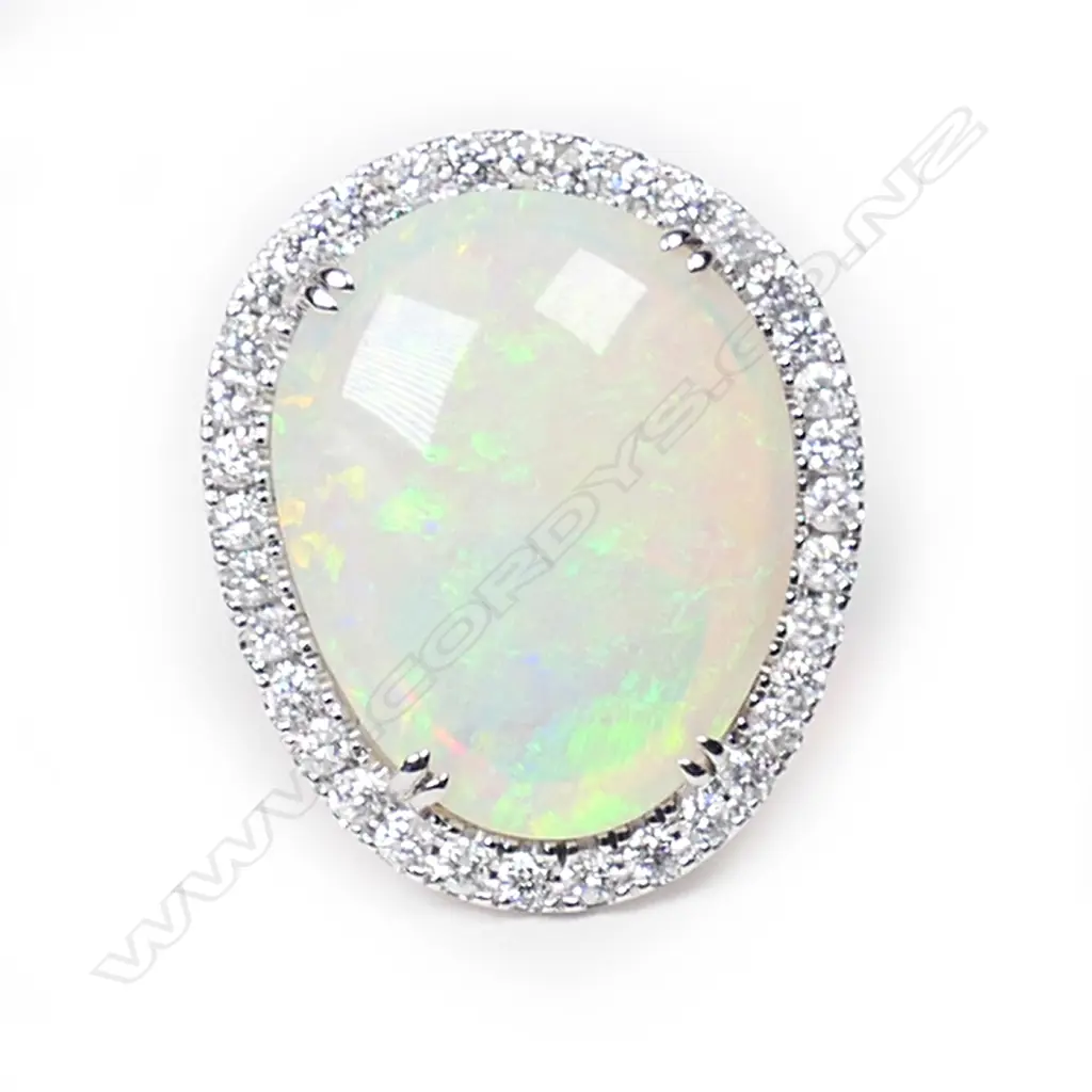 A 14ct white gold, opal and diamond cocktail ring, Image 1++