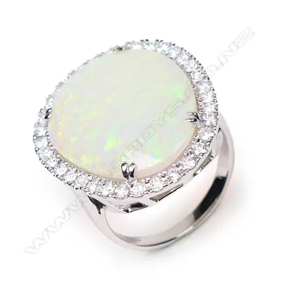 A 14ct white gold, opal and diamond cocktail ring,
