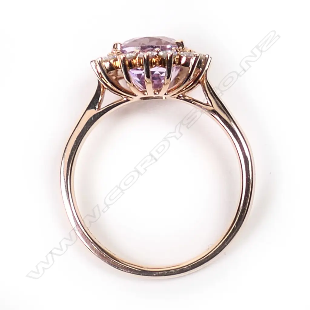 A 14ct rose gold, kunzite and diamond halo ring, Image 1++
