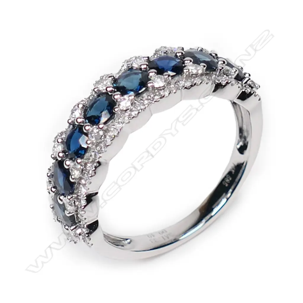 A 14ct white gold, sapphire and diamond halo eternity style ring, Image 1++