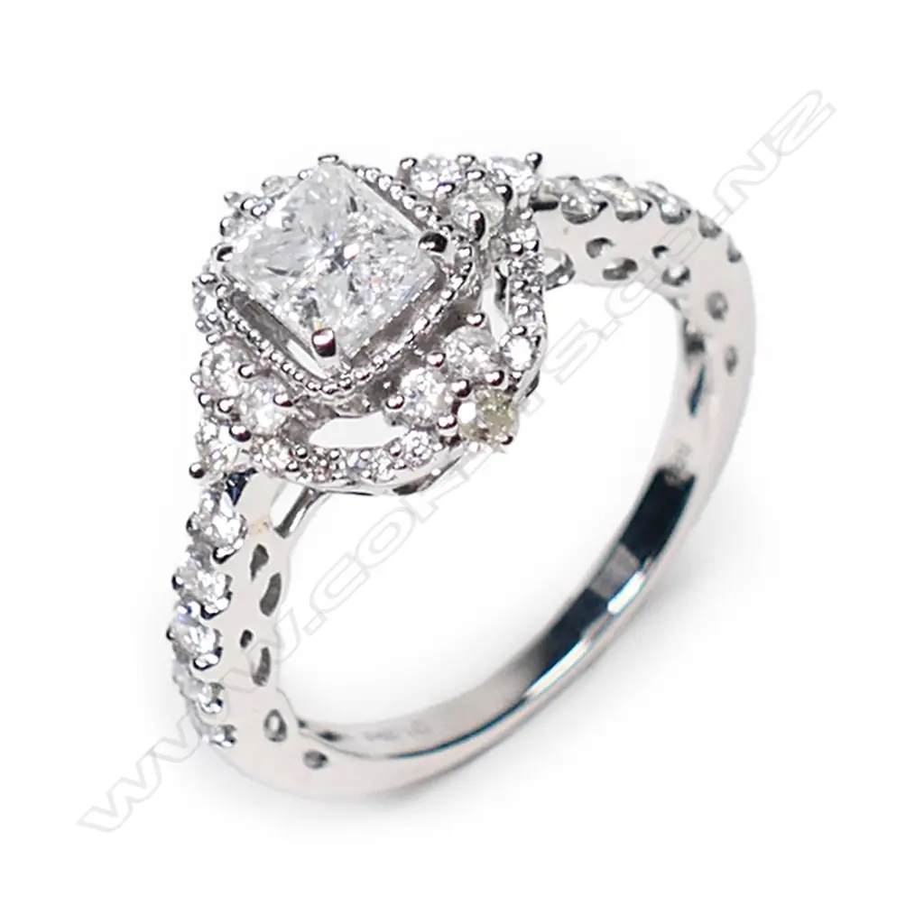 A 14ct white gold and diamond dress ring, Image 1++