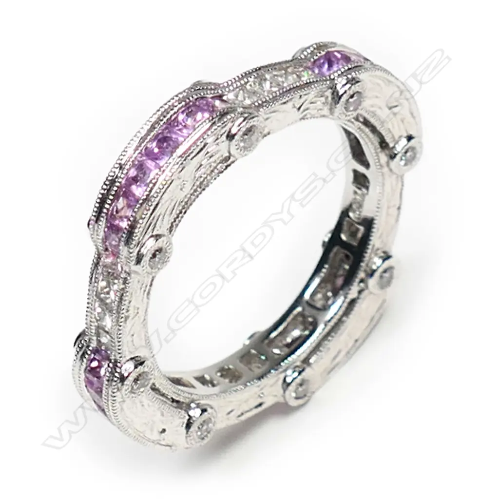An 18ct white gold, diamond and pink sapphire ring, Image 1++