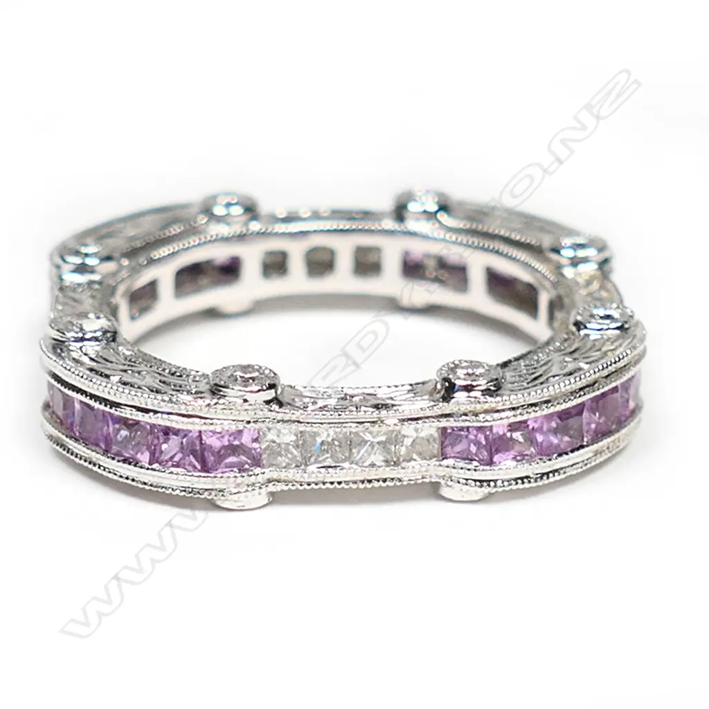 An 18ct white gold, diamond and pink sapphire ring, Image 1++