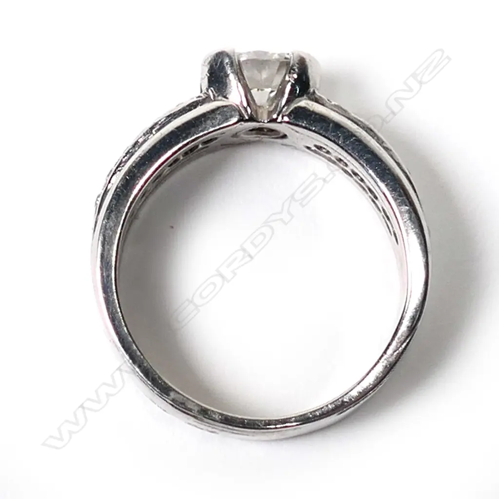 An 18ct white gold and solitaire diamond ring, Image 1++