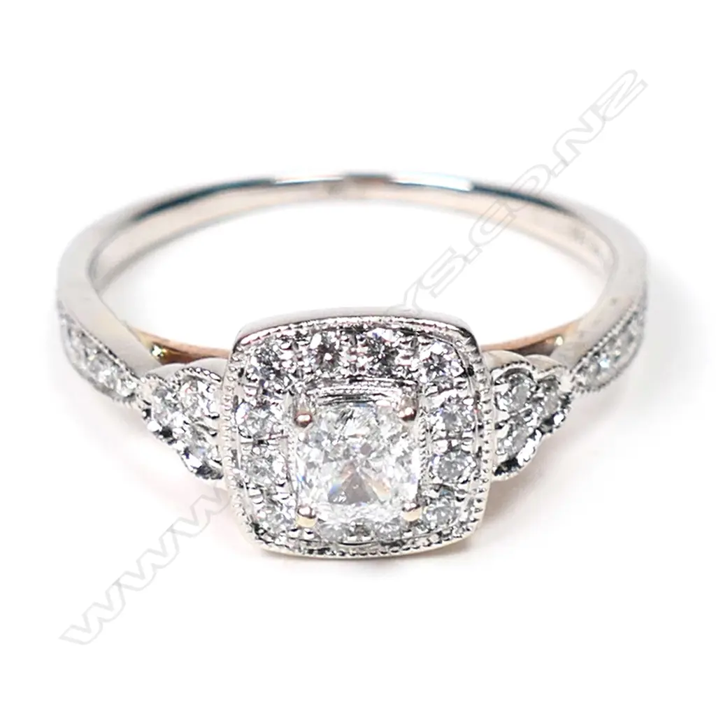 A 14ct white gold and diamond dress ring, Image 1++