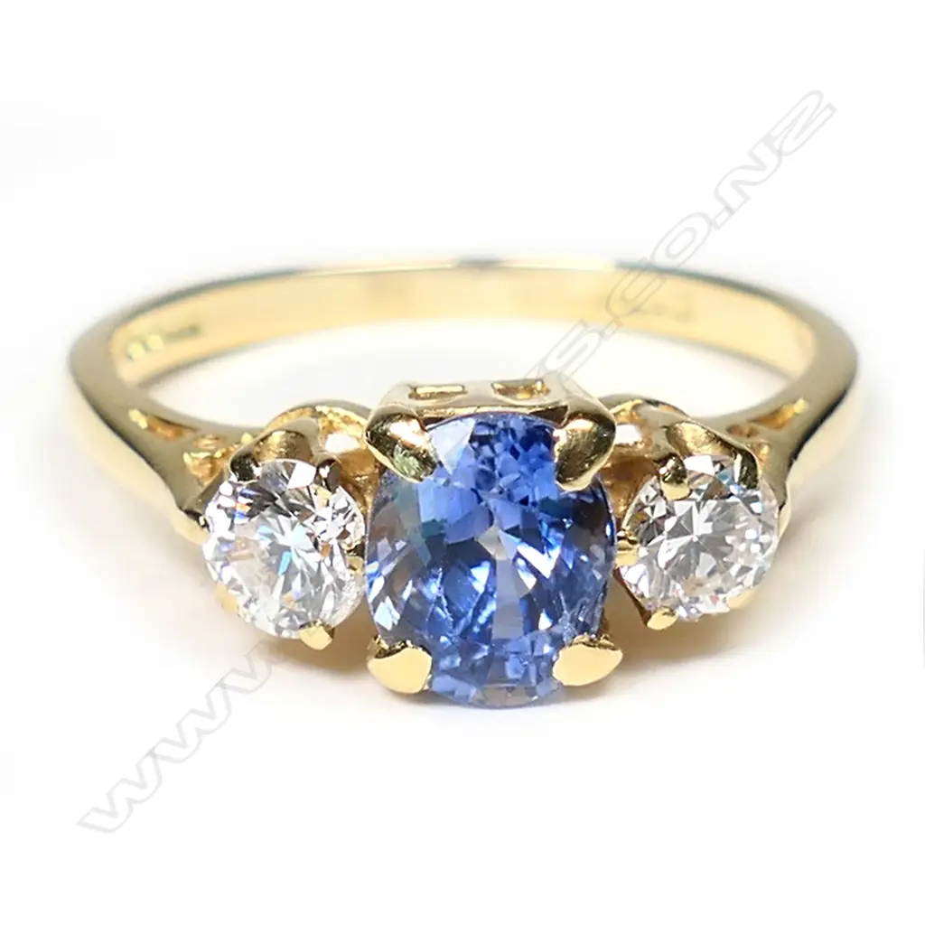 An estate 18ct gold sapphire and diamond ring, Image 1++