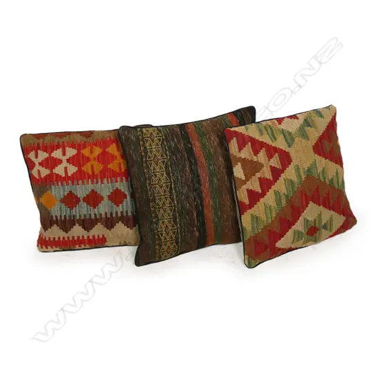 Three scatter cushions with slit weft kilim faces,