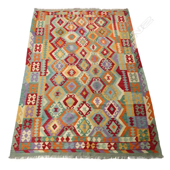 A large hand-woven kilim carpet