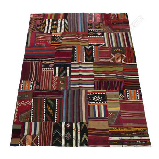 A large Turkish patchwork carpet,