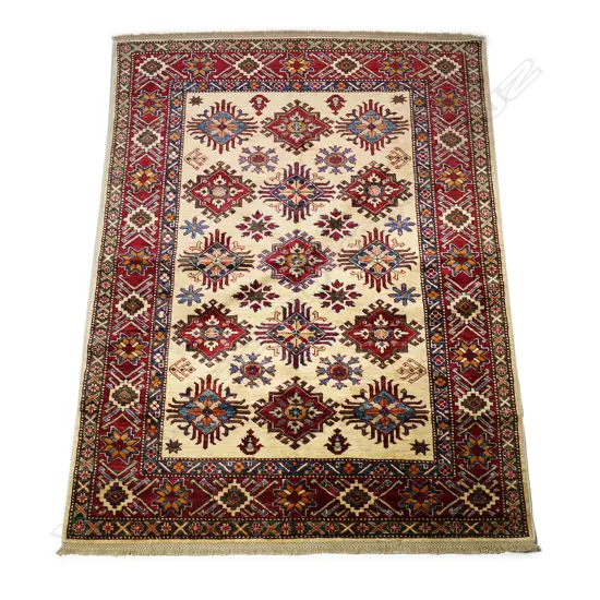A tribal Kazak rug, hand knotted wool pile,