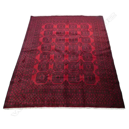 A large hand knotted Turkman 'elephant's foot' pattern carpet