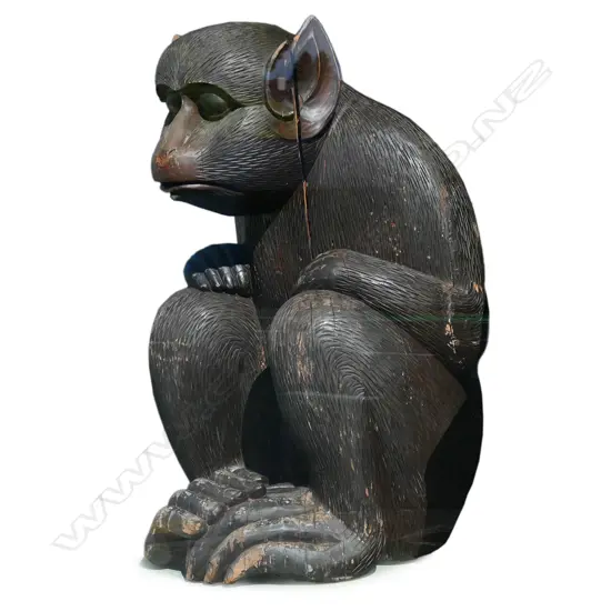 A large and decorative carved Japanese wooden macaque (monkey) sculpture,