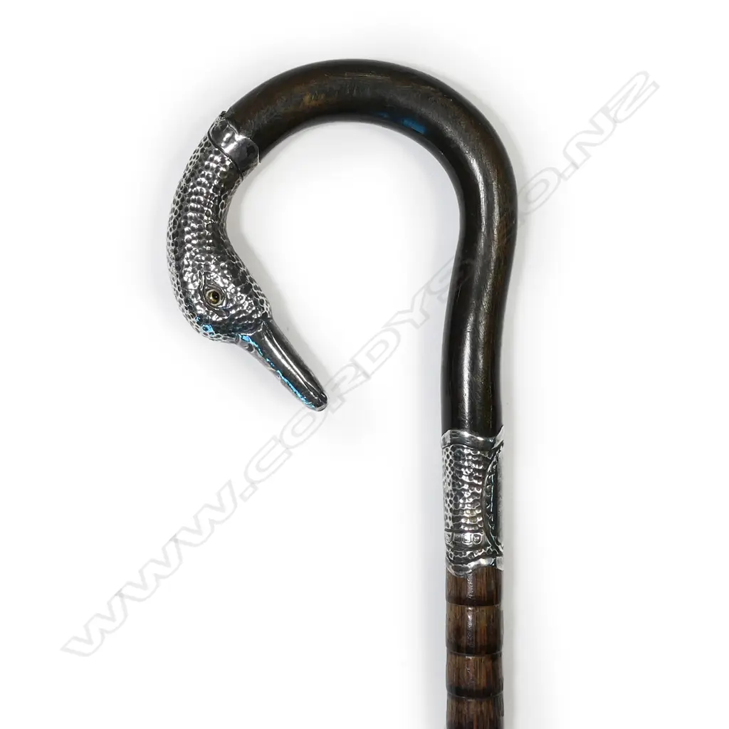 A lady's walking cane, with silver swan's head handle Image 1++