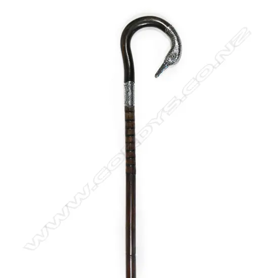 A lady's walking cane, with silver swan's head handle