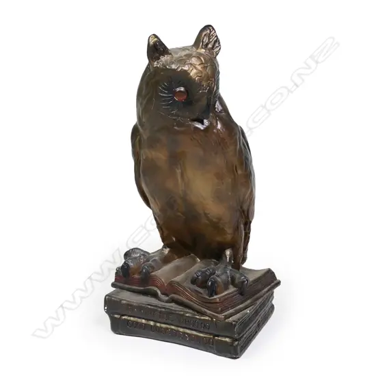 An early 20thC ceramic/plaster large owl lamp,