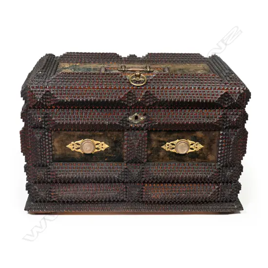 A late 19thC tramp art carved musical jewel box,