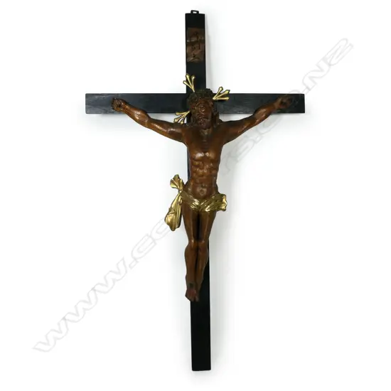 A large 19thC wood crucifix,