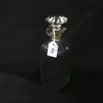 Four antique pewter pieces including a pair of baluster column candlesticks and two bowls of which one is handled. H.290mm Image 1++