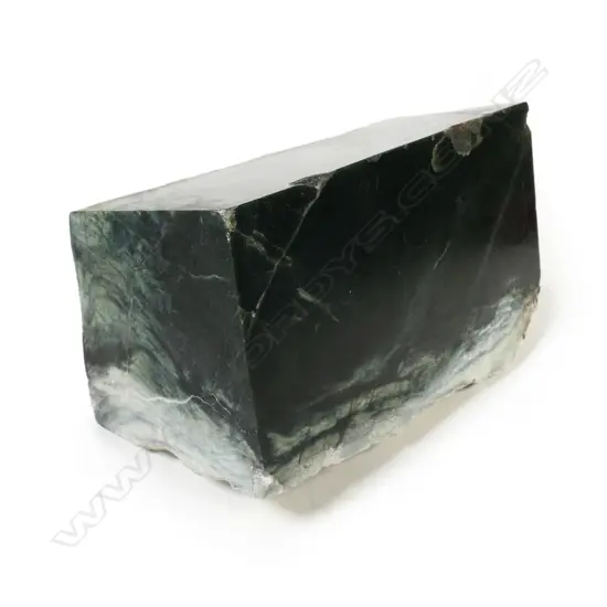 A large natural and cut block of nephrite pounamu,