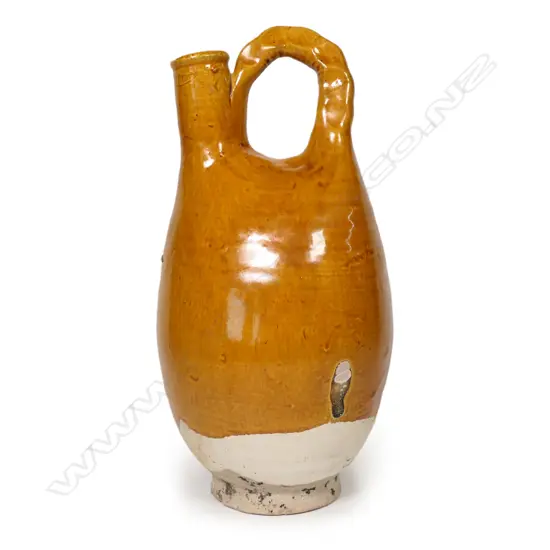 An old Chinese Liao dynasty style amber-glazed ewer,