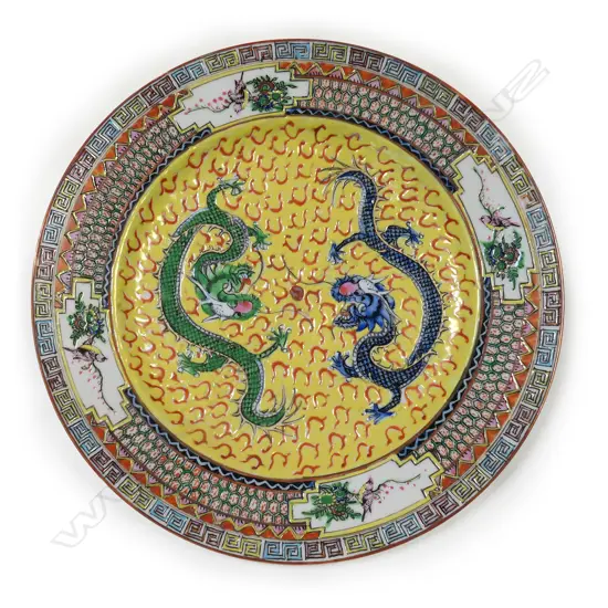 An old Chinese double dragon porcelain plate,
