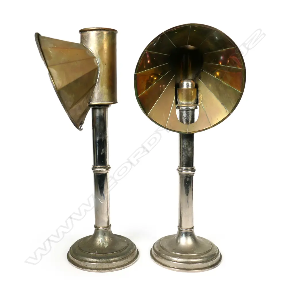 A pair of silver-plated copper and brass 19thC spring-loaded candlesticks Image 1++