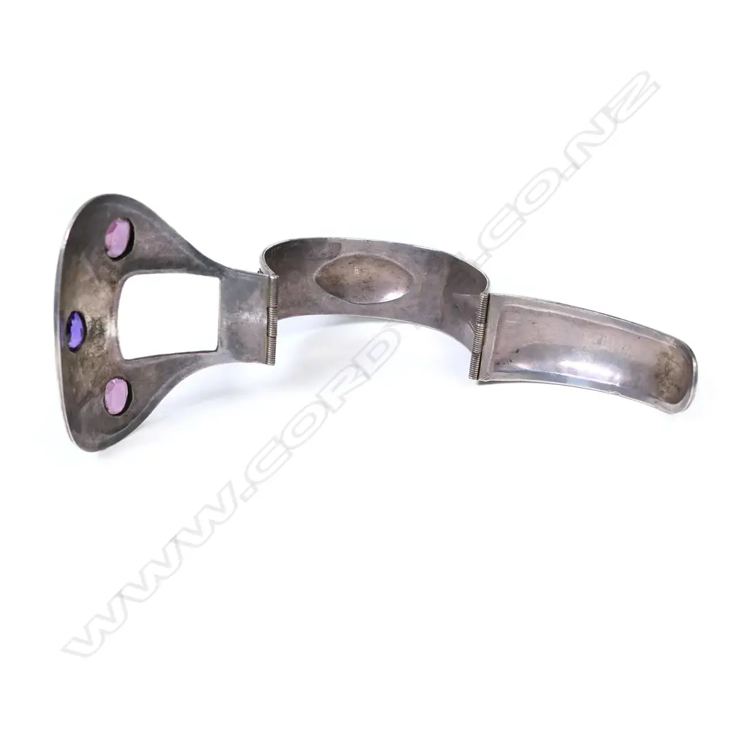 An early 20thC fancy silver hinged belt and buckle bangle, Image 1++