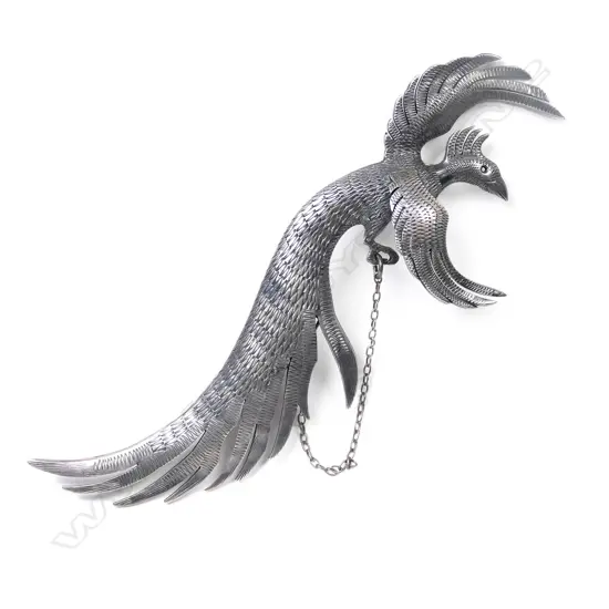 A Tony Buller silver brooch,