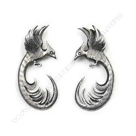 A pair of Tony Buller silver phoenix earrings,