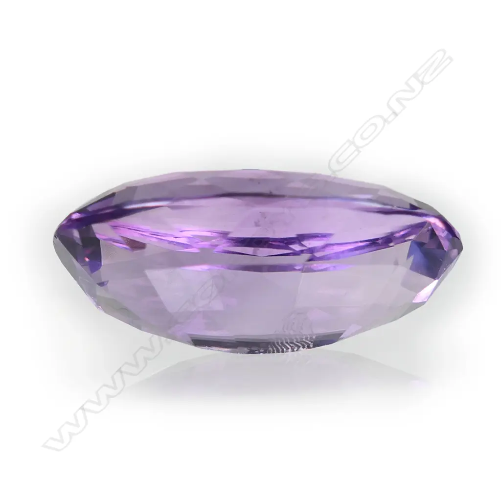 A 37.21ct oval mixed cut amethyst. Image 1++
