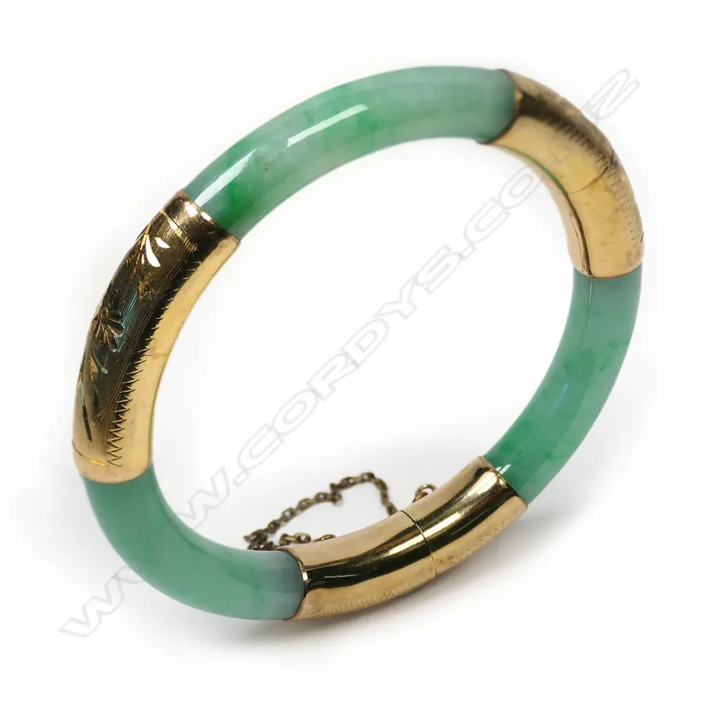 A 14k yellow gold and pale jadeite hinged bangle, Image 1++
