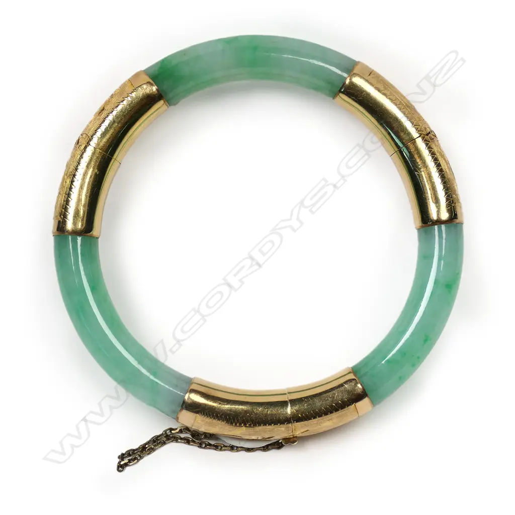 A 14k yellow gold and pale jadeite hinged bangle, Image 1++