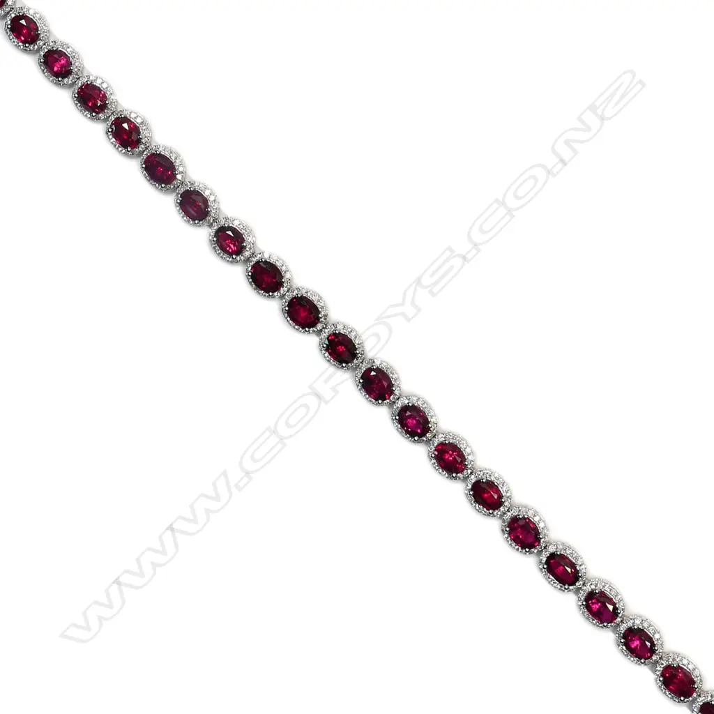 An impressive 18ct white gold and multi ruby and diamond cluster bracelet, Image 1++