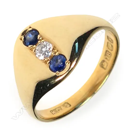 An 18ct gold, sapphire and diamond signet type ring,