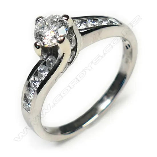 A 14ct white gold and diamond solitaire ring,