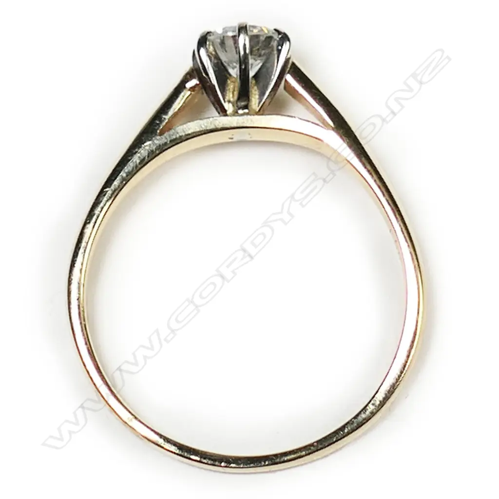 An 18ct gold and diamond solitaire ring, Image 1++