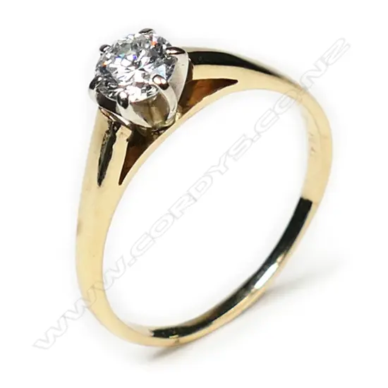 An 18ct gold and diamond solitaire ring,