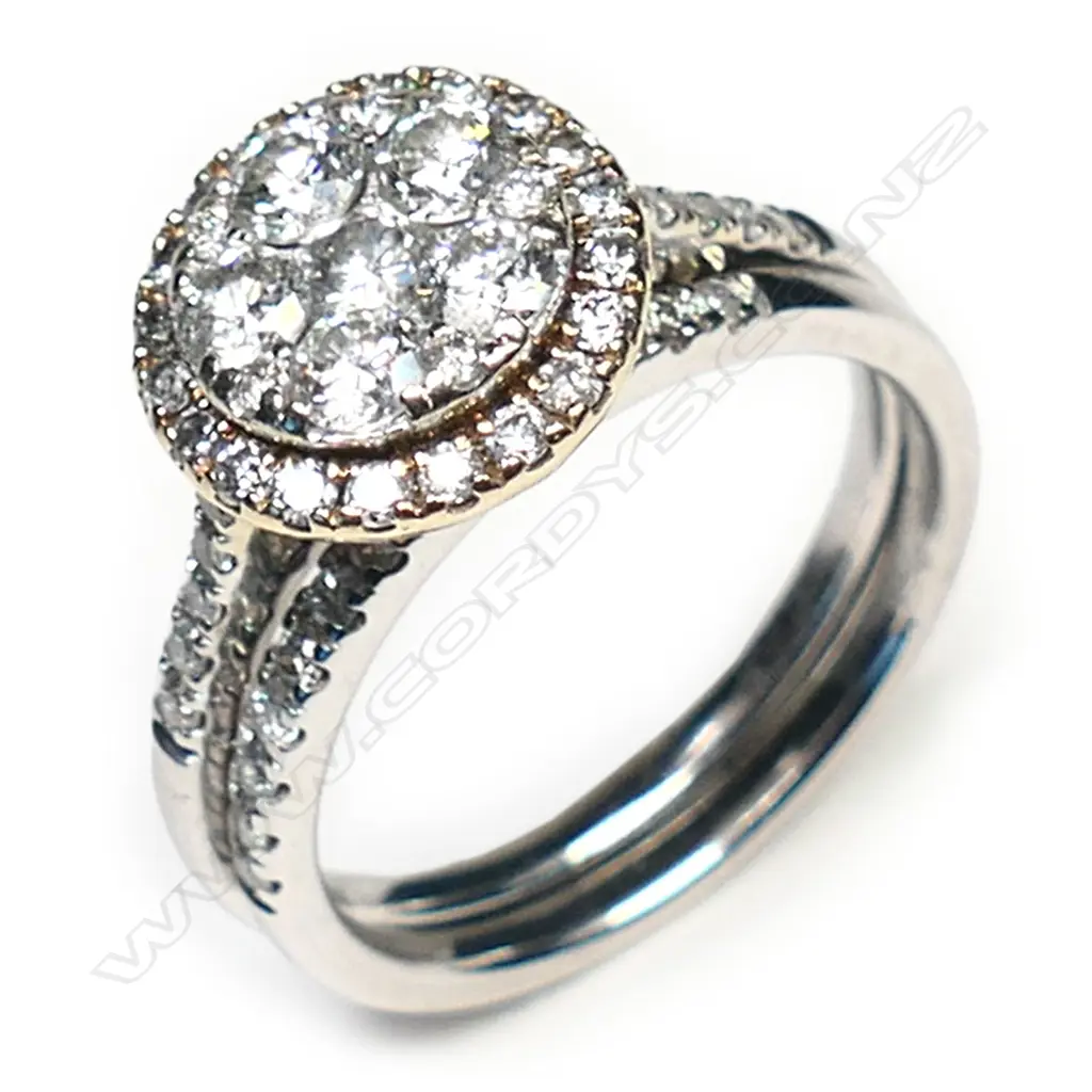 A 10ct white gold and diamond cluster ring set, Image 1++