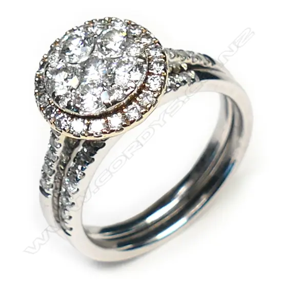 A 10ct white gold and diamond cluster ring set,