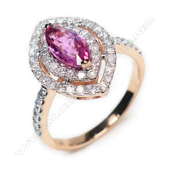A 14ct rose gold pink sapphire and diamond double halo ring,