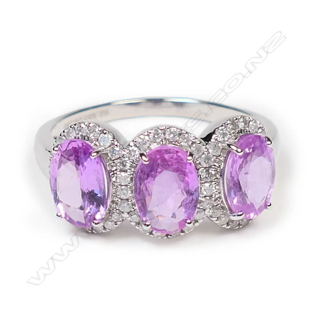 A 14ct white gold pink sapphire and diamond trilogy ring, Image 1++