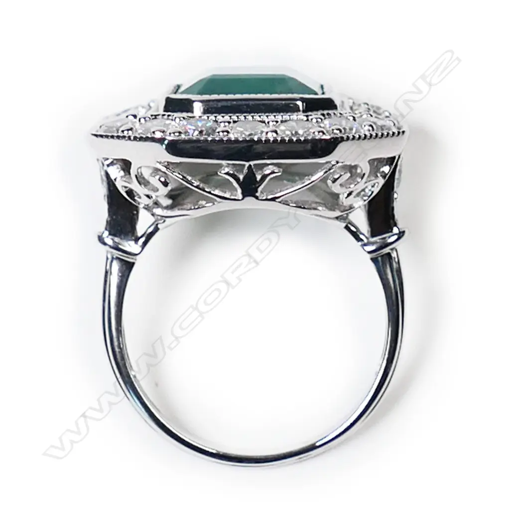 A 14ct white gold emerald and diamond Art Deco style ring, Image 1++