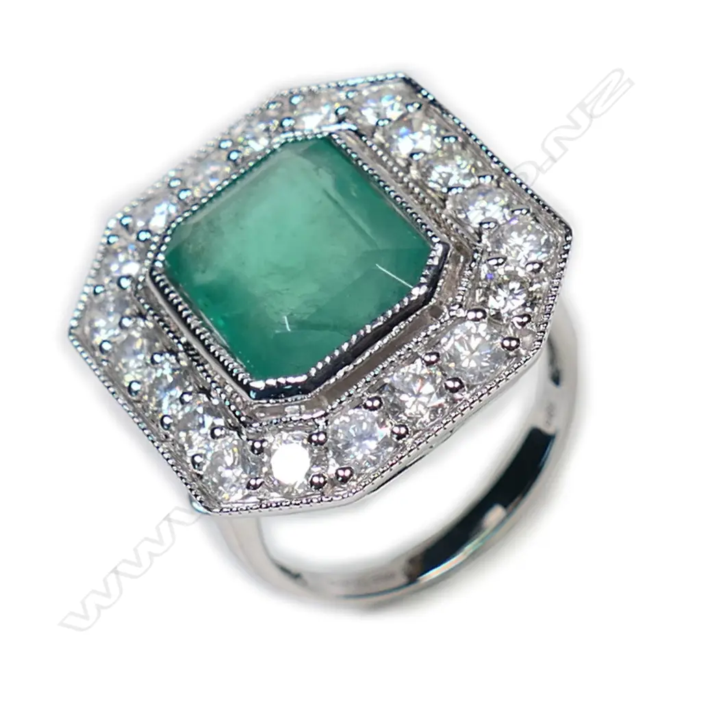 A 14ct white gold emerald and diamond Art Deco style ring, Image 1++